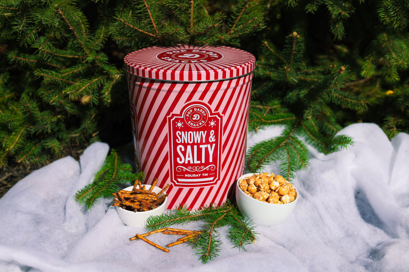 <p>SNACK-PACKED<br/><em>holiday</em> TINS!</p>